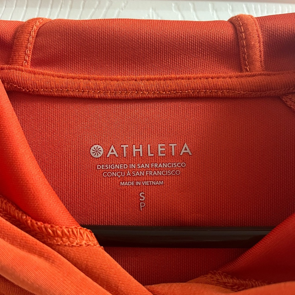 Athleta orange hoodie.
